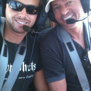 Freed flying with his son, Robert